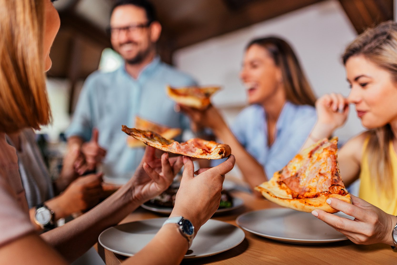 A group enjoying pizza