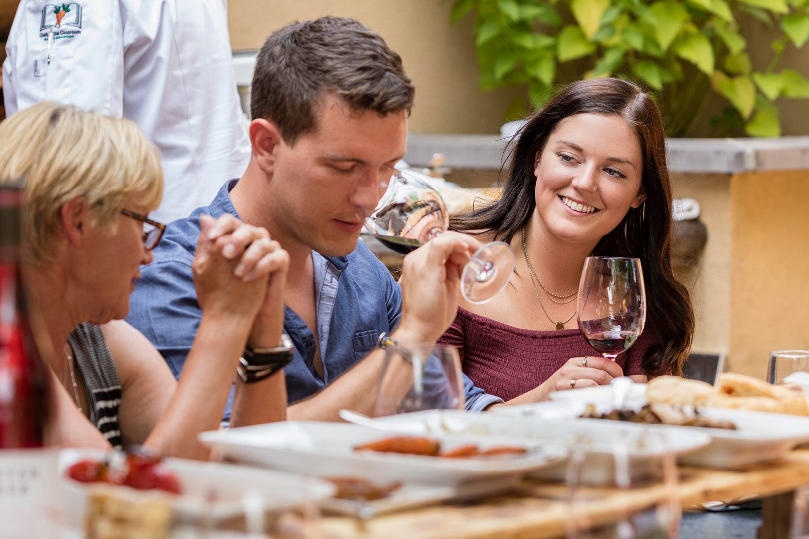 Group enjoying lunch at the Tuscan Patio